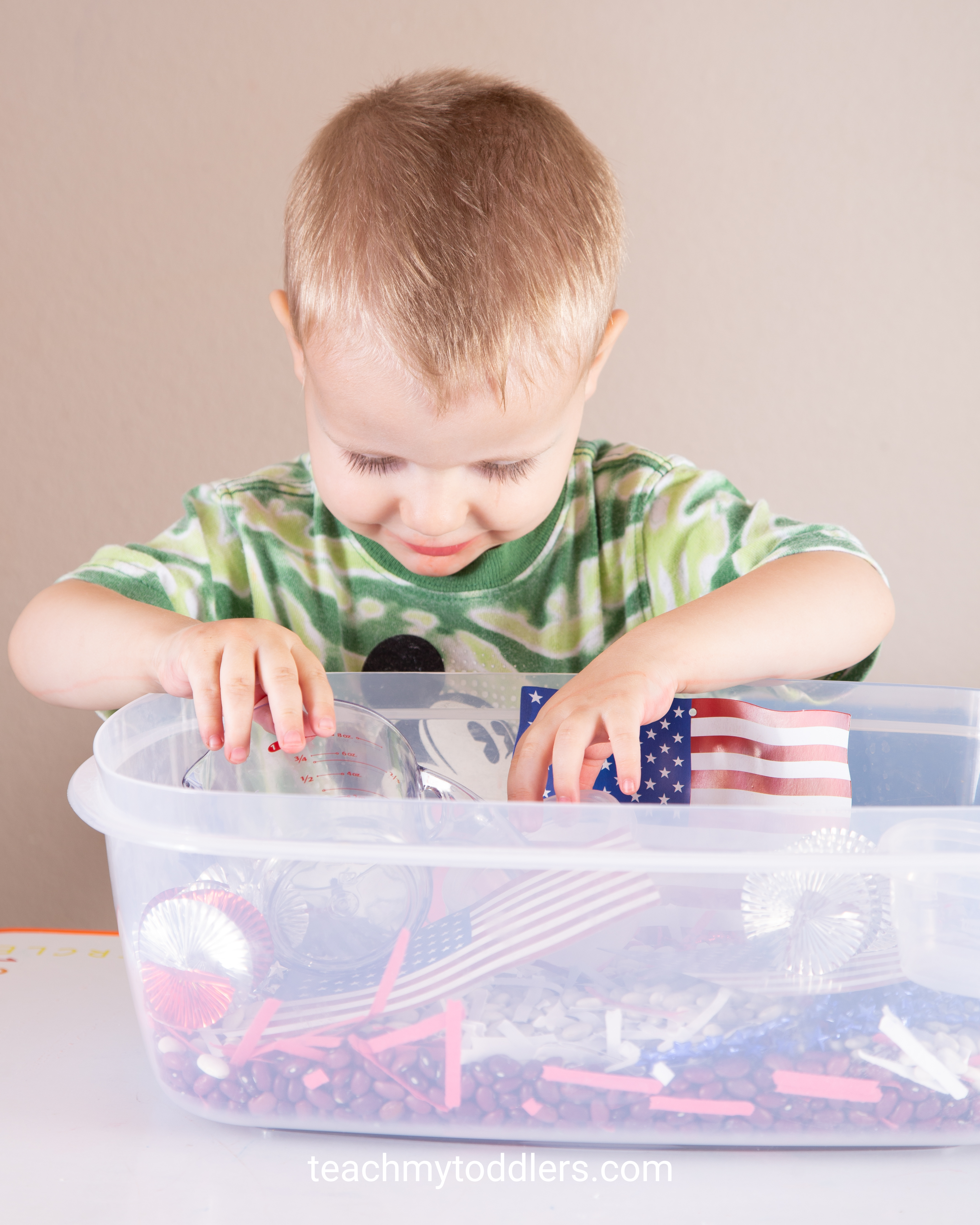 Discover how to use this fun red, white and blue sensory bin to teach your toddlers about the 4th of july
