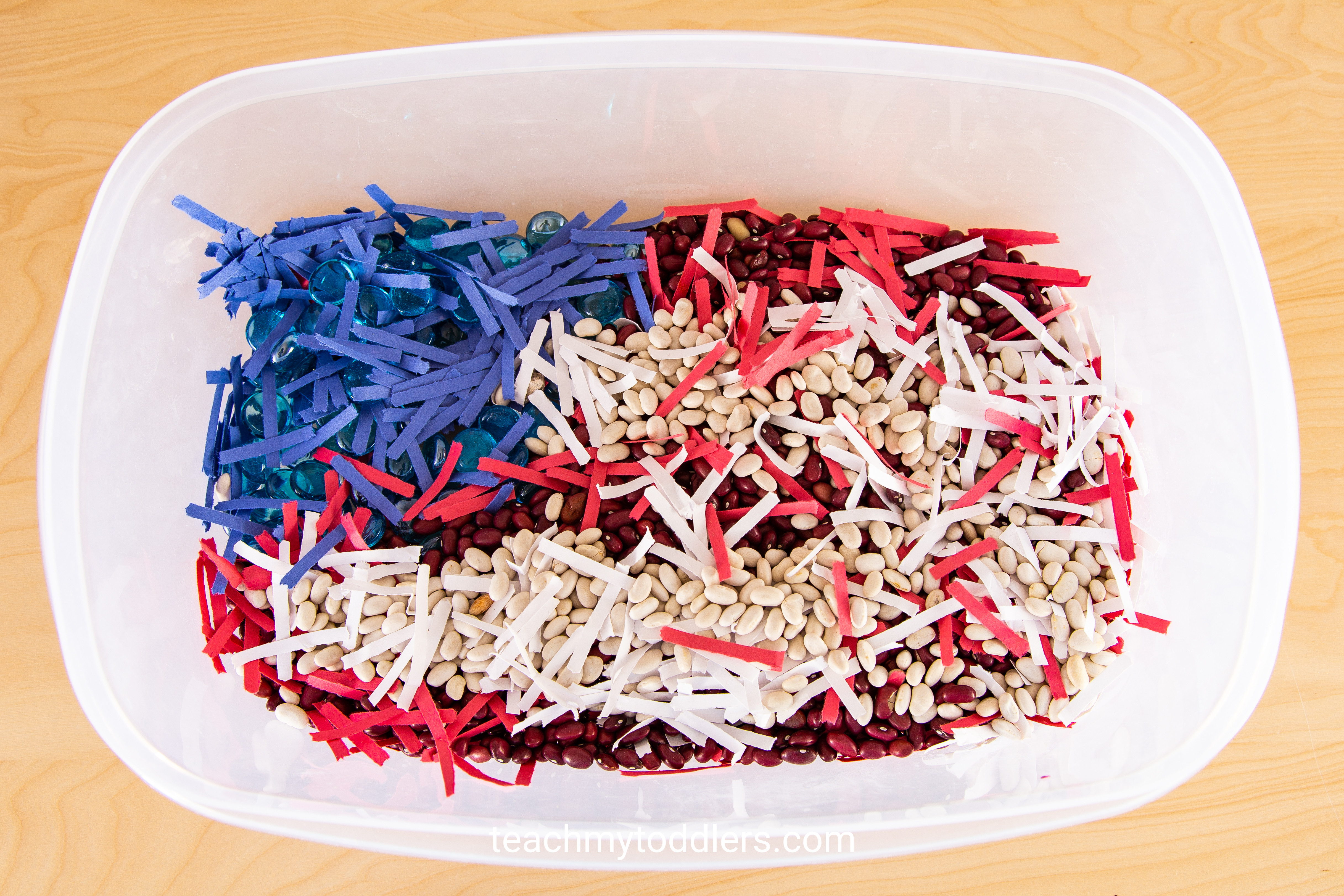 Learn how to use this red, white and blue sensory bin to teach toddlers about the 4th of july